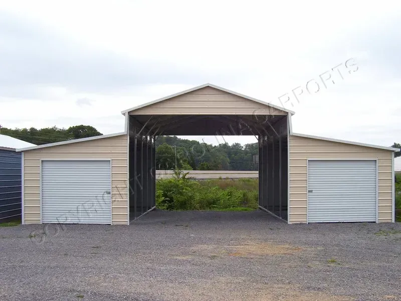 Tan metal garage with a central open-air bay, two enclosed bays, and a gravel driveway under a cloudy sky.