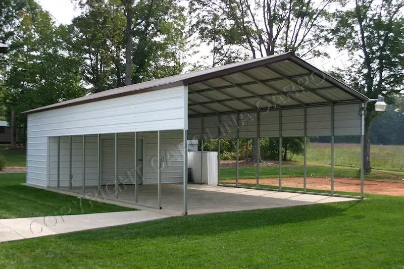 White metal carport with a brown roof on a grassy area, trees in the background.