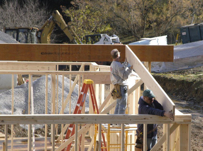 A construction site with a ladder in the foreground