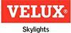 A red and white logo for velux skylights on a white background.
