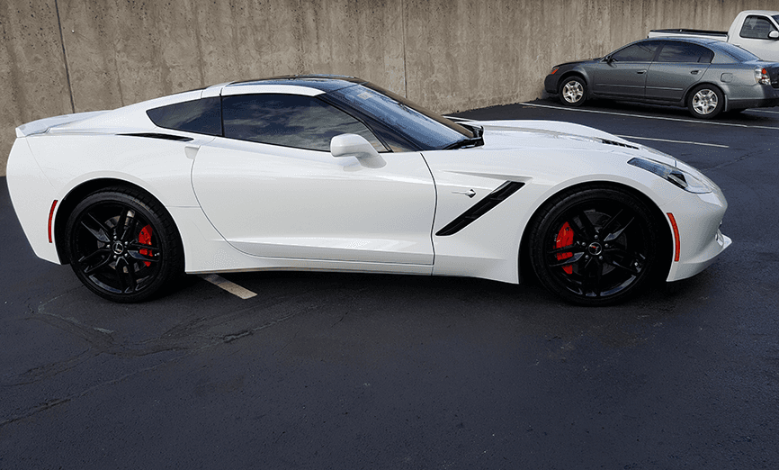 White sports car with tinted windows