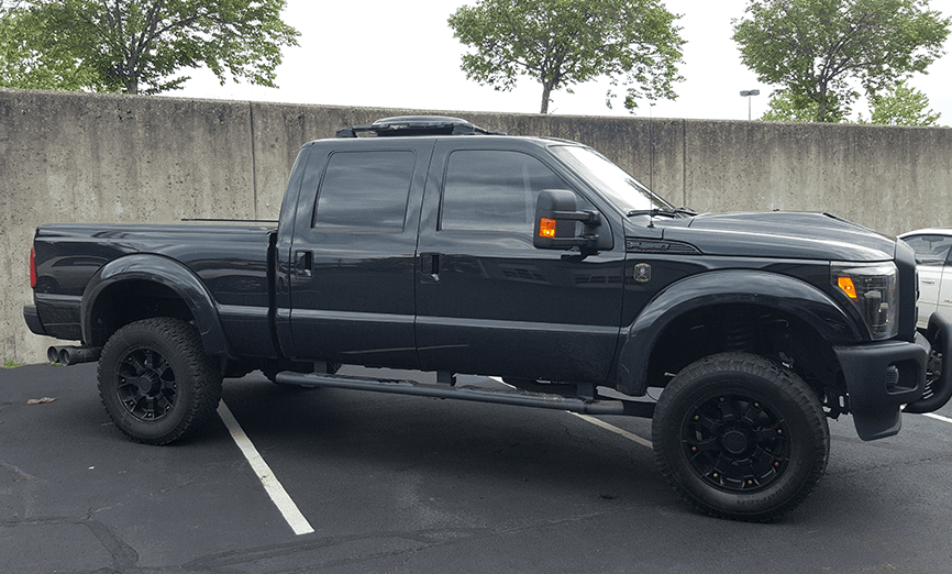 Black pickup truck with tinted windows