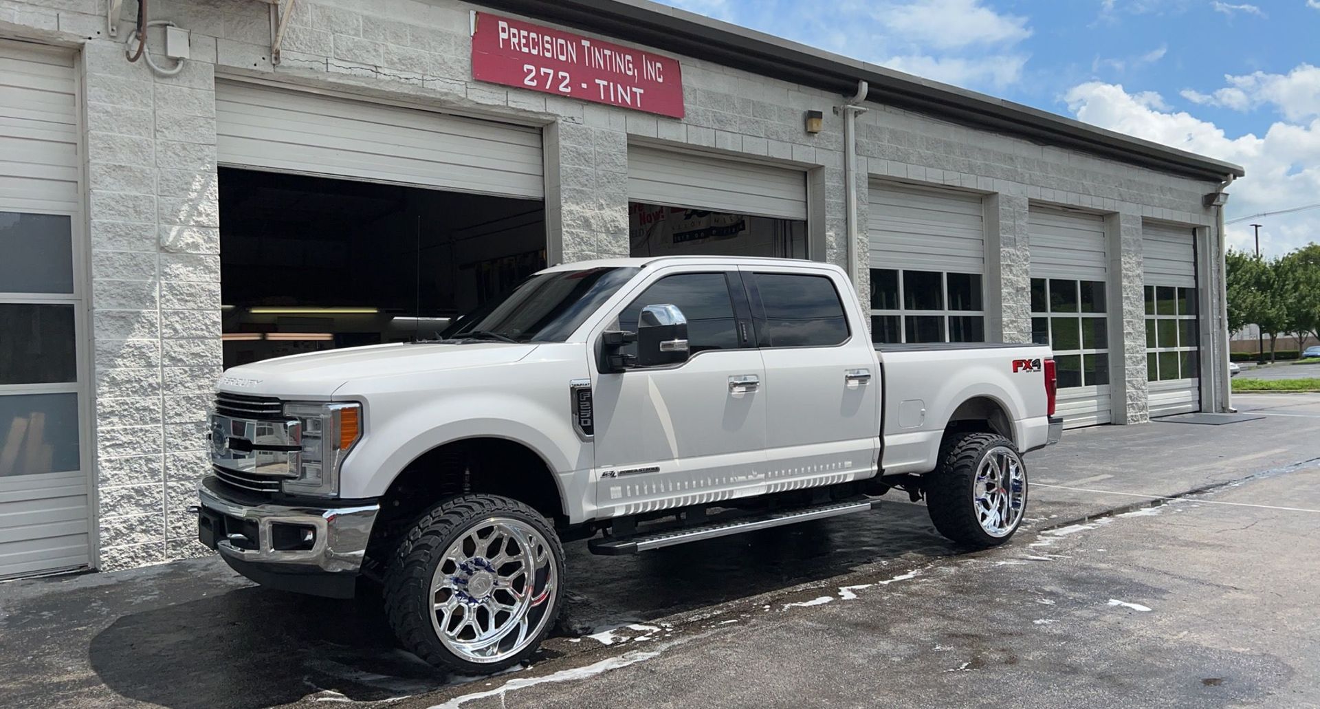 White pickup truck with tinted windows