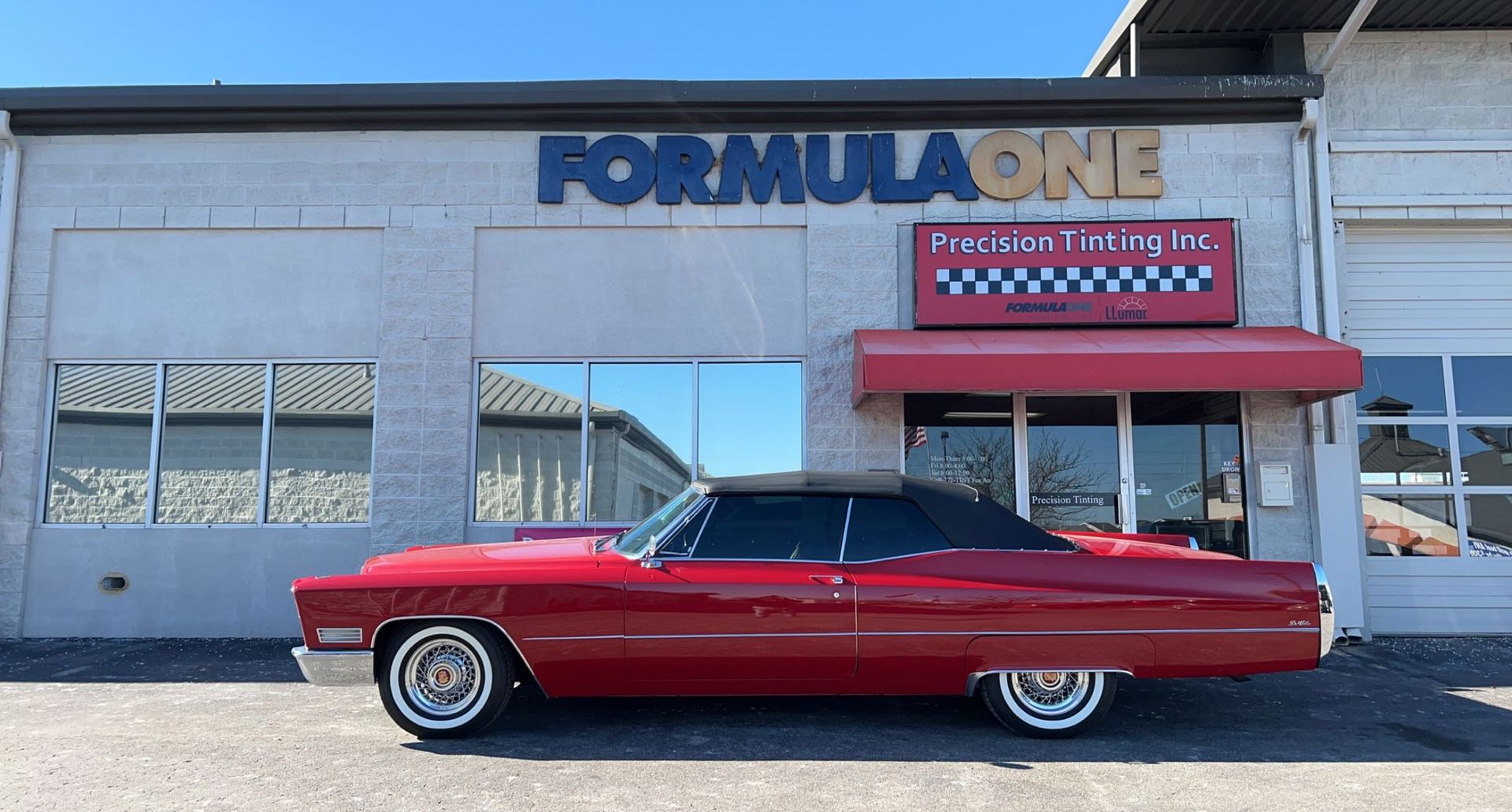 Red convertible with tinted windows