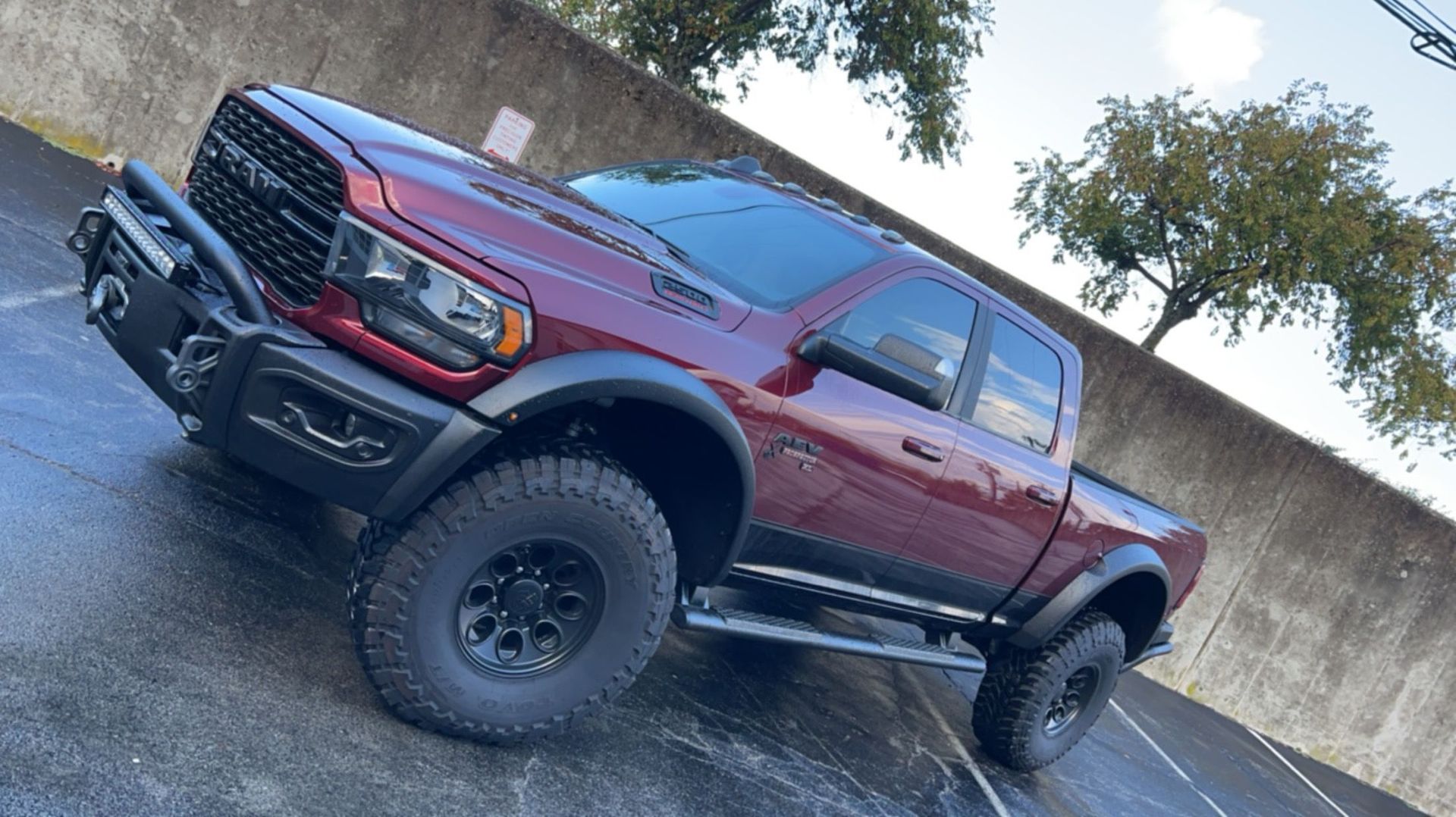 Red Ram pickup truck with tinted windows