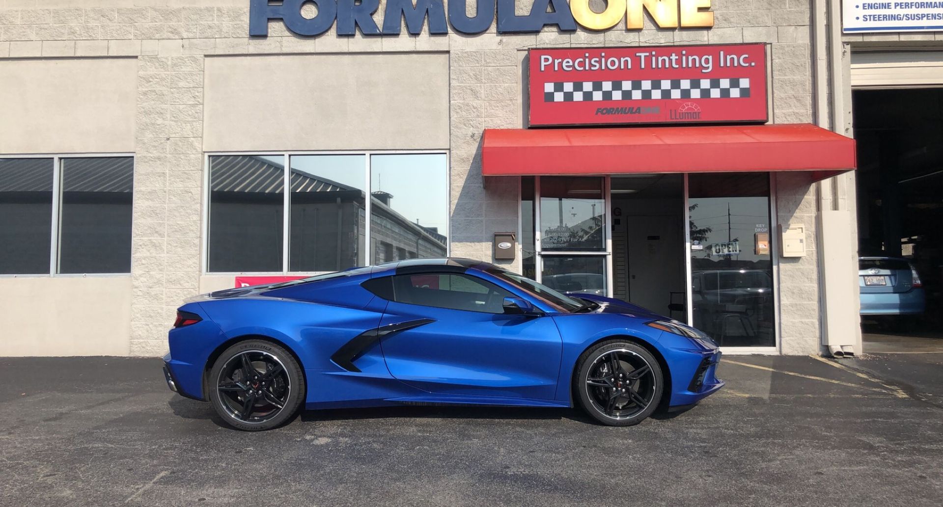 Bright blue sports car with tinted windows