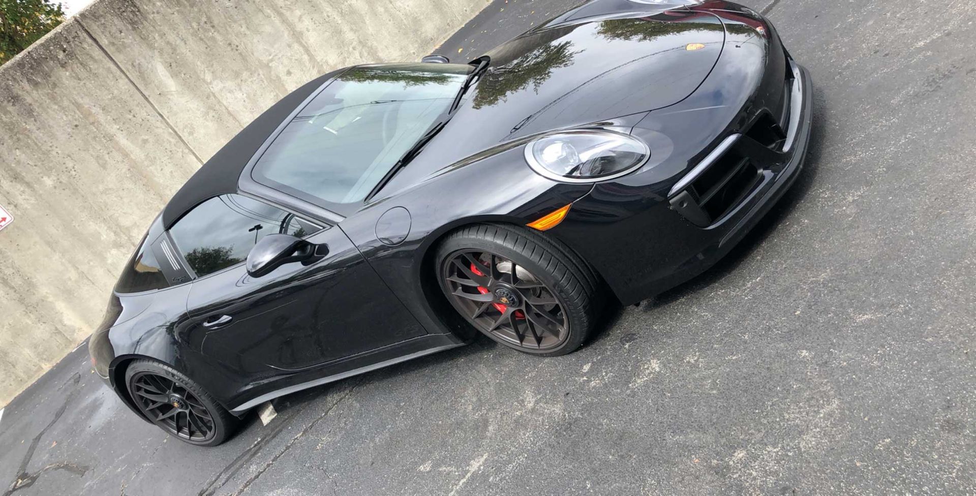 Black sports car with tinted windows