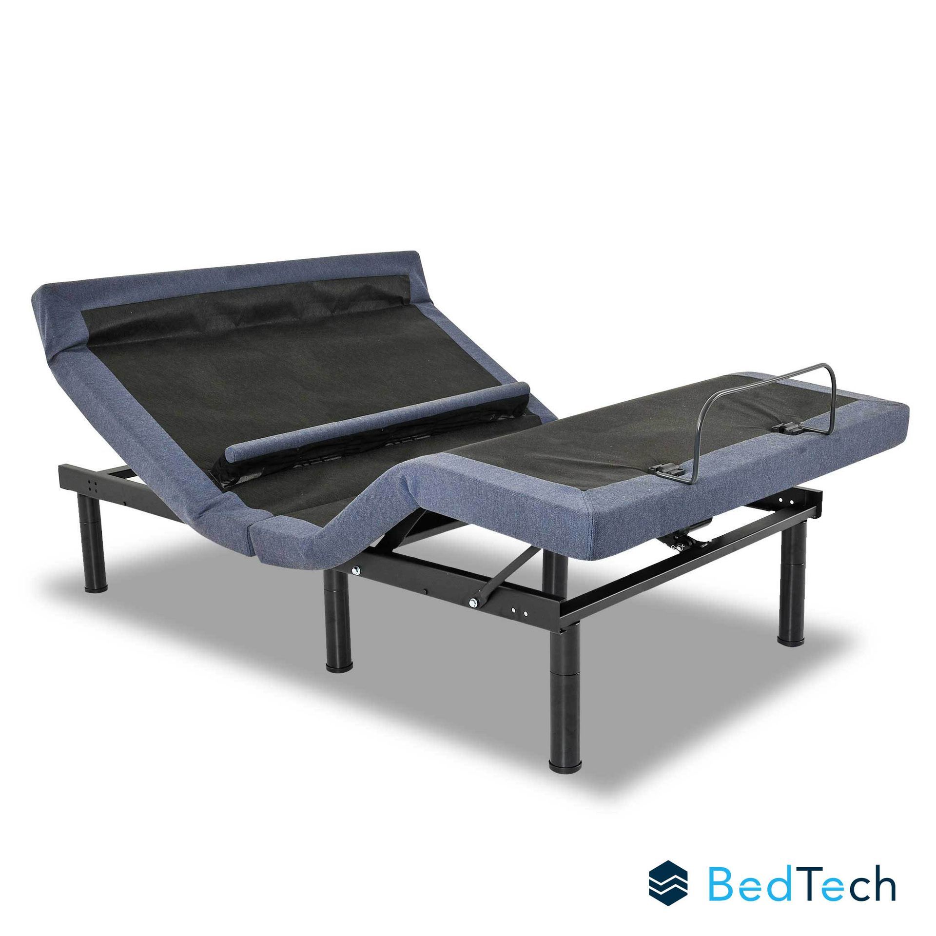 Blue adjustable hospital bed on black metal frame with raised backrest and leg support.
