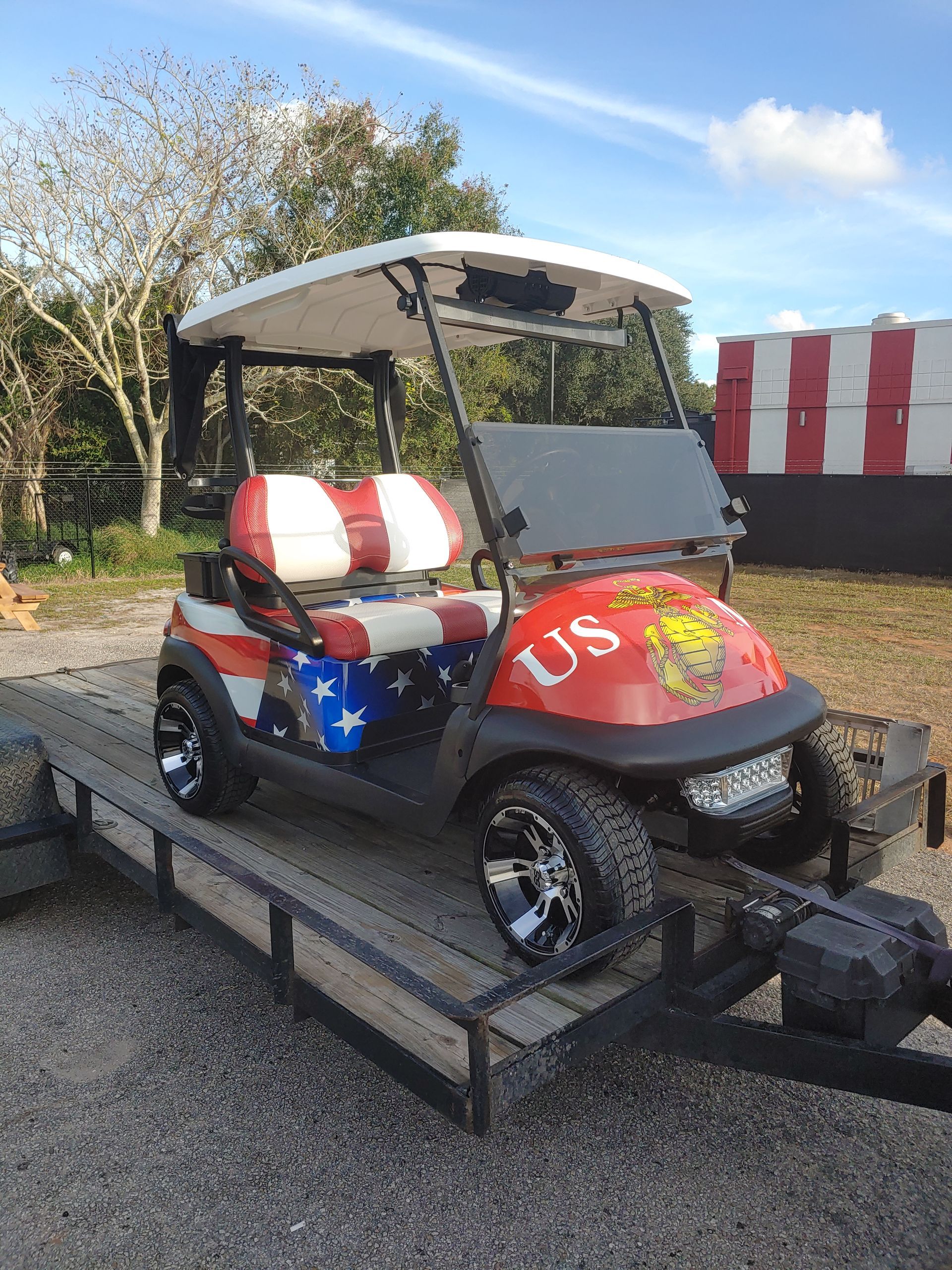 Patriotic golf cart with American flag design and 