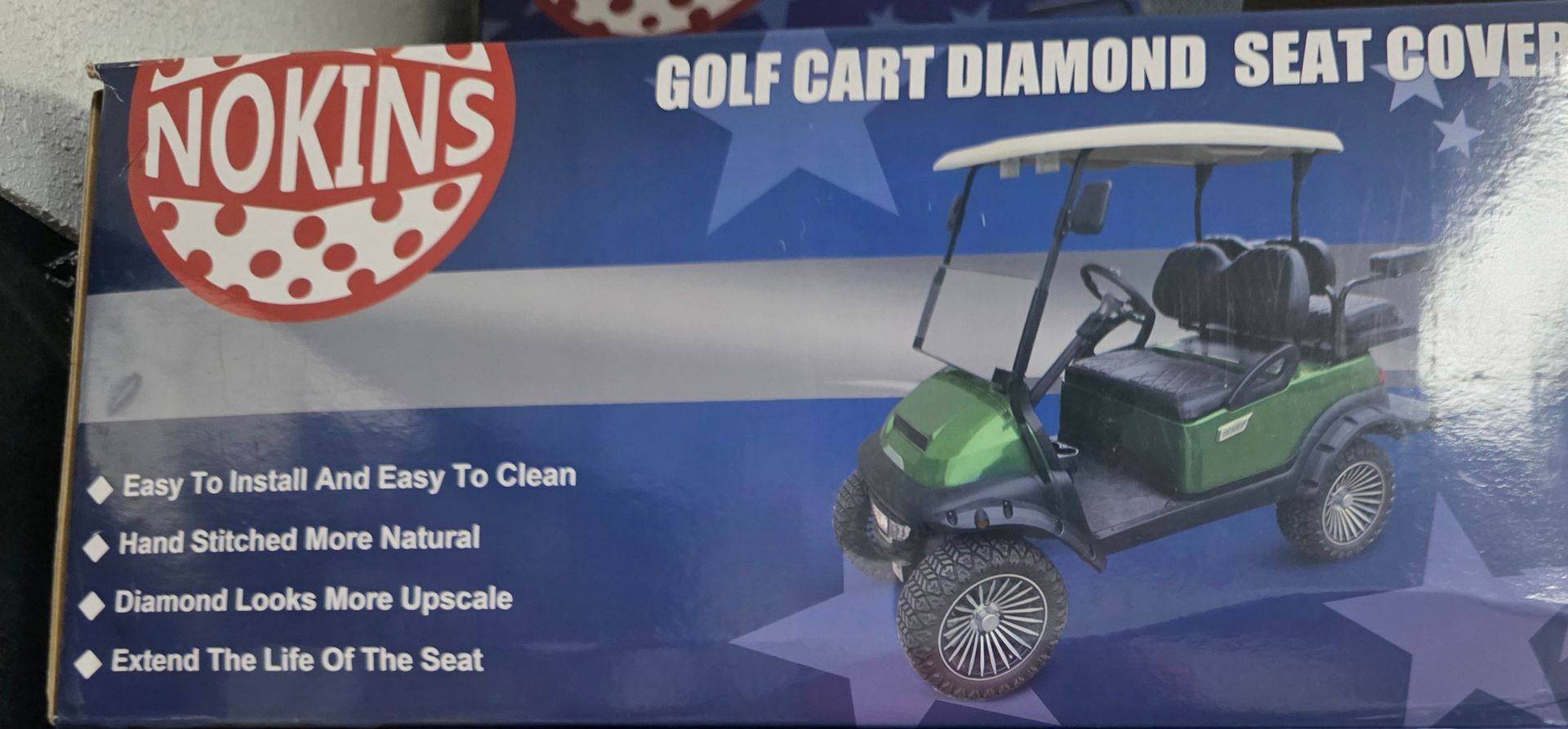 NOKINS golf cart diamond seat cover packaging with blue background and golf cart image