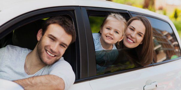 Family riding with insured car