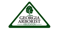 Georgia Arborist Association logo with a tree inside a green triangle.
