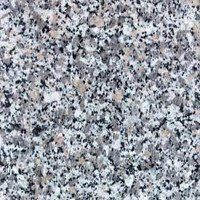 A close up of a granite counter top with a lot of small stones.