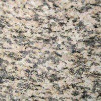 A close up of a granite counter top.