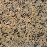 A close up of a granite counter top with a lot of small stones on it.