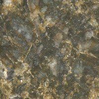 A close up of a brown granite counter top.