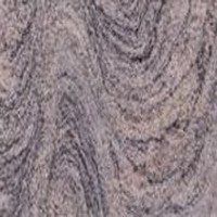 A close up of a marble texture with a swirl pattern.