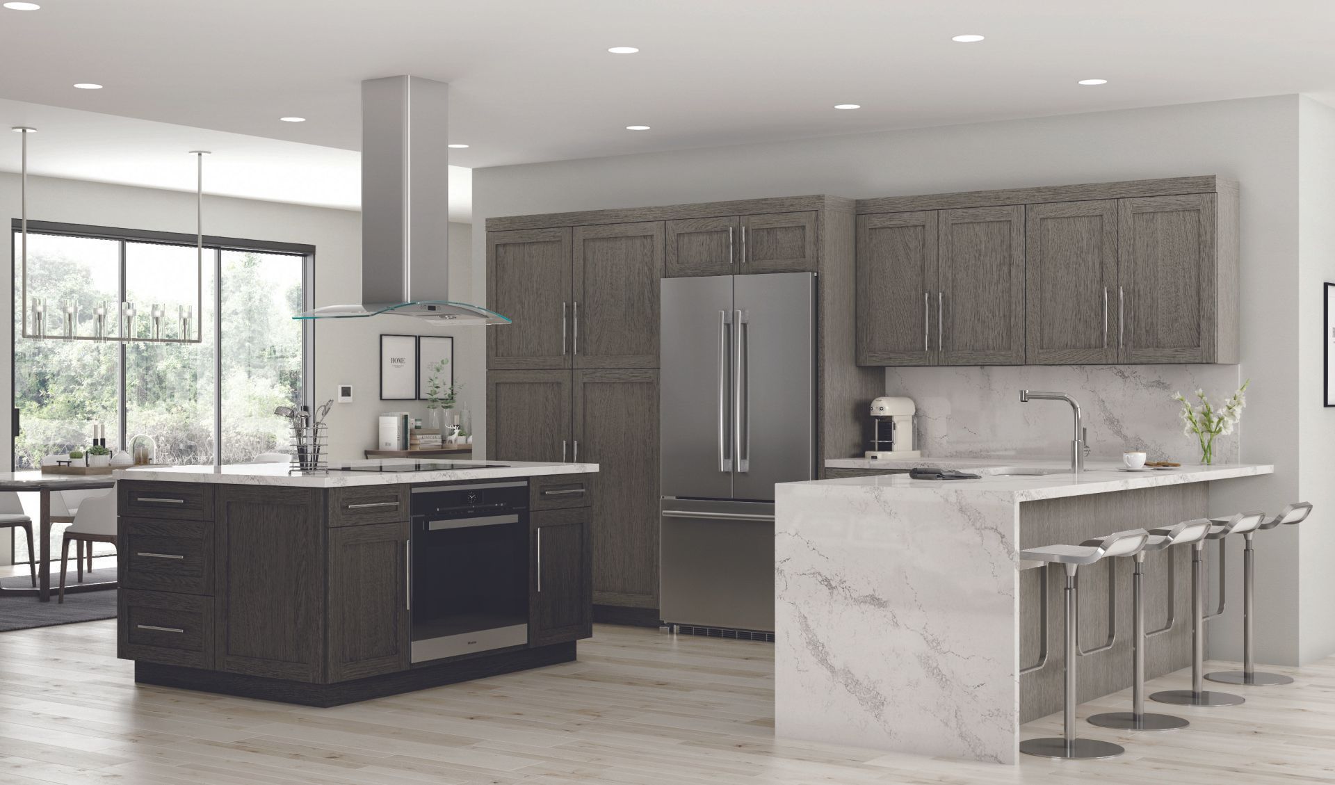 A kitchen with stainless steel appliances and a large island.