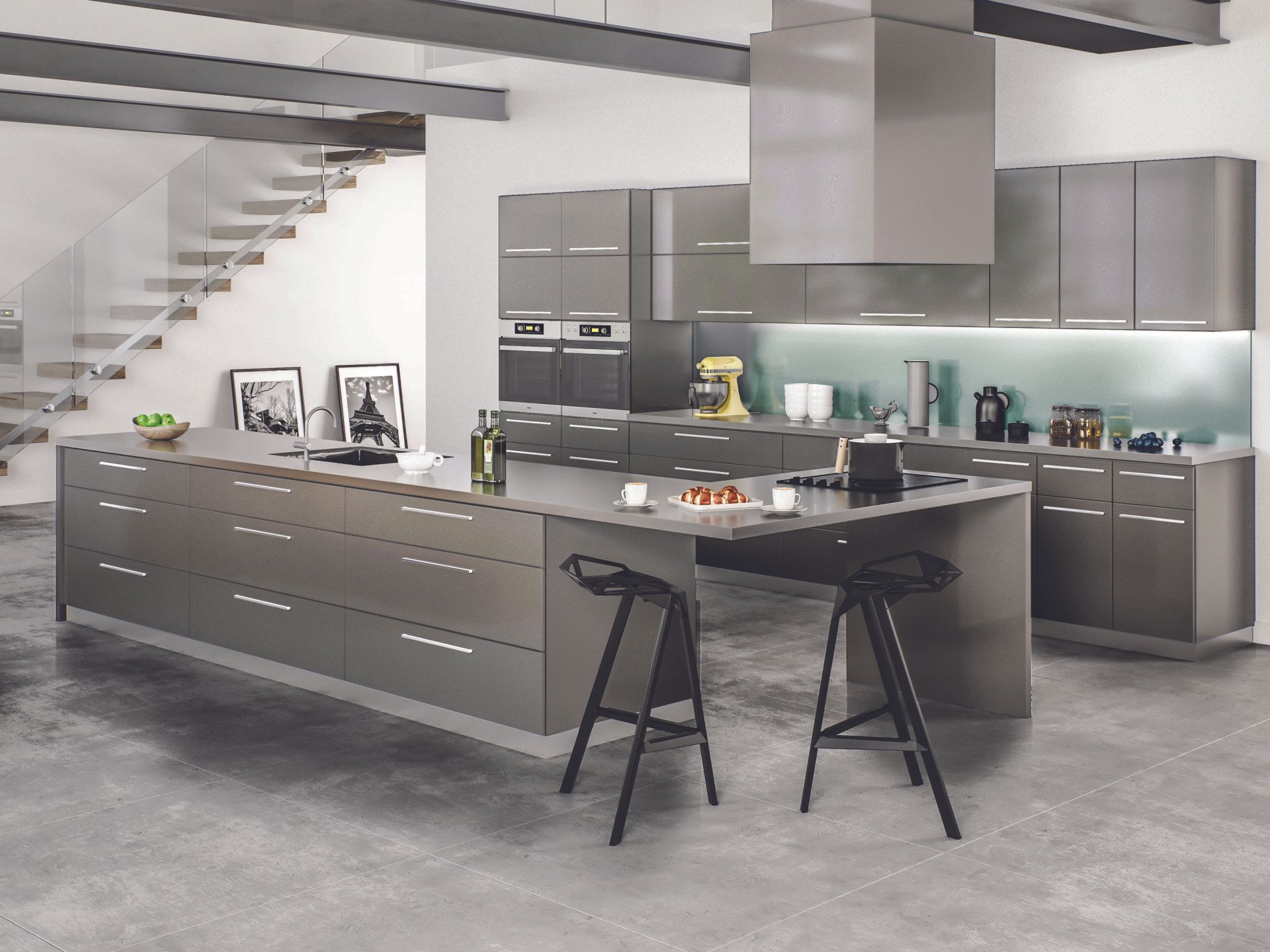 A modern kitchen with a large island and stools