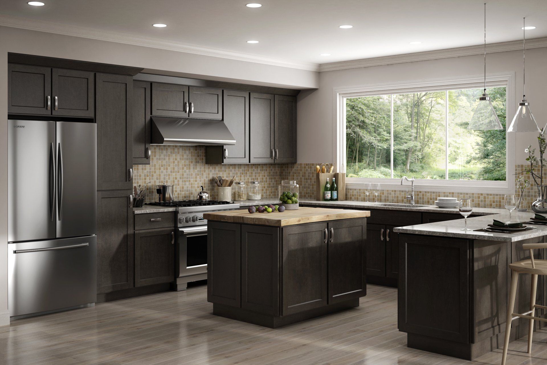 A kitchen with gray cabinets , stainless steel appliances , a large island and a window.