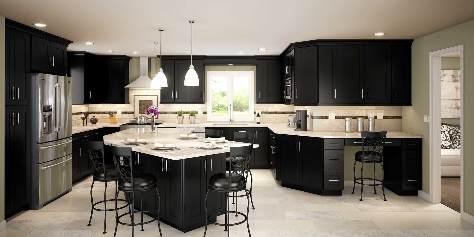 A kitchen with black cabinets and stainless steel appliances