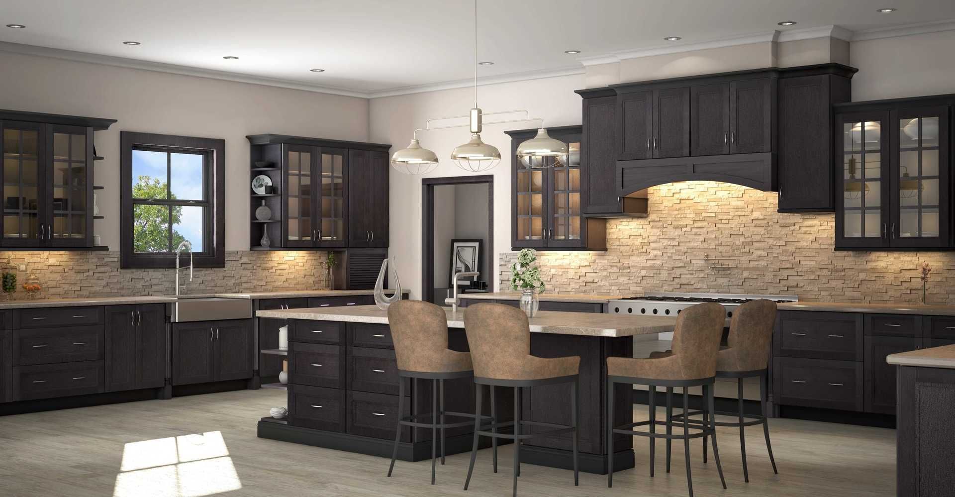A kitchen with black cabinets and a large island in the middle.
