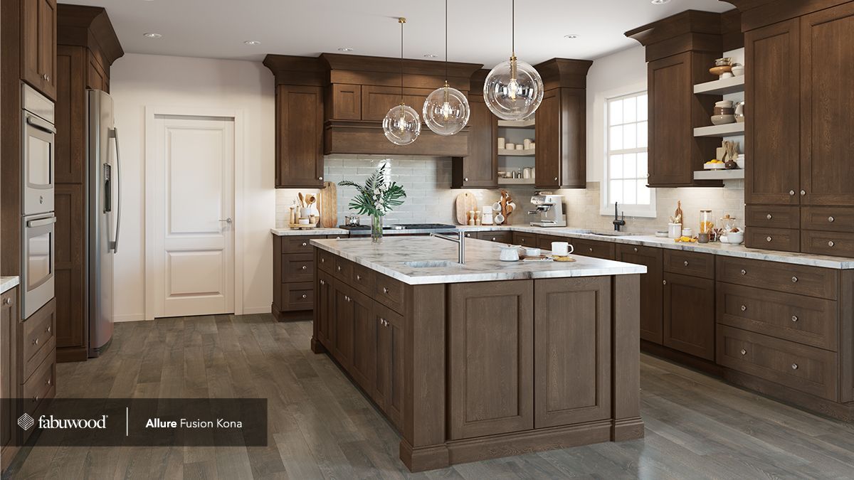 A kitchen with a large island in the middle of it