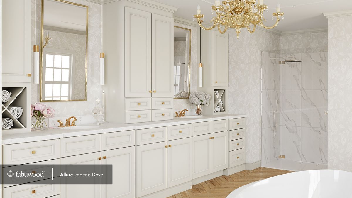 A bathroom with a bathtub, sink, mirror, and chandelier.
