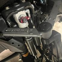 A close up of a suspension system on a vehicle