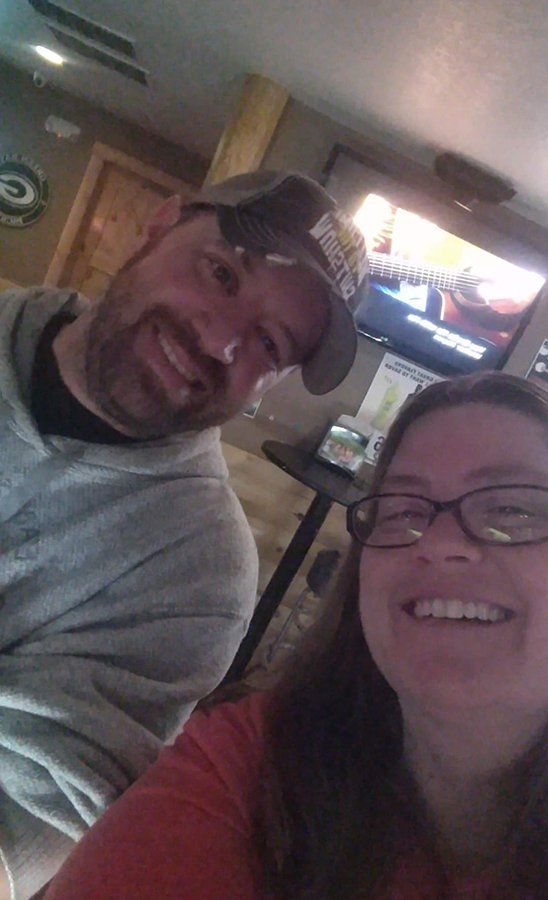 Man and women smiling