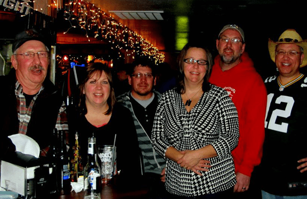 Group people having a great time in the bar