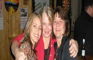 Women smiling inside the bar