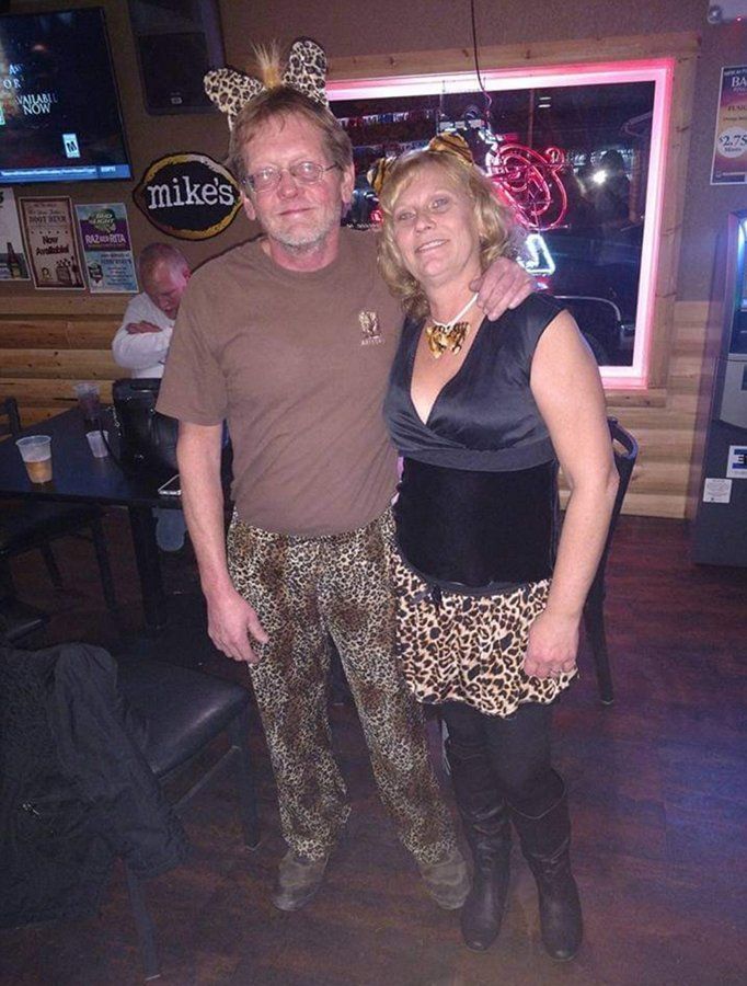 Men and women inside sports bar