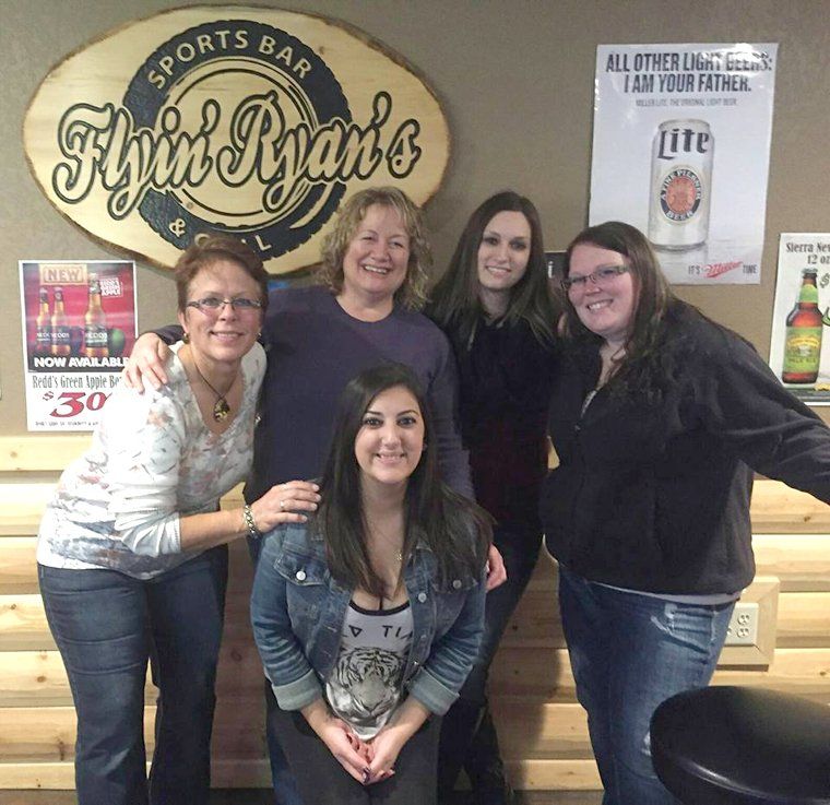 People having fun inside the sports bar