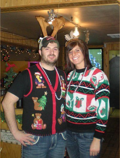Two people wearing a christmas clothes