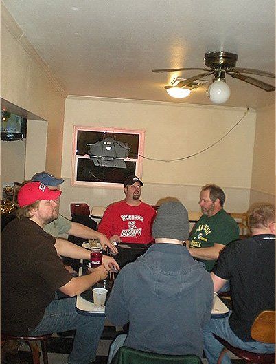 People having discussion in the sport bar