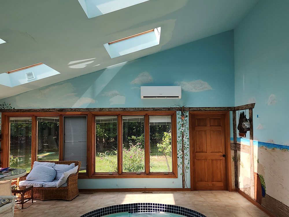 There is a swimming pool in the middle of the room.