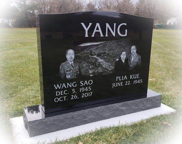 Black granite headstone with the name