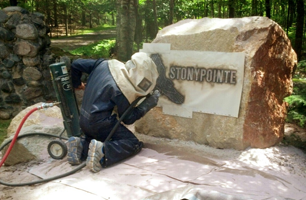 Man sandblasting a 