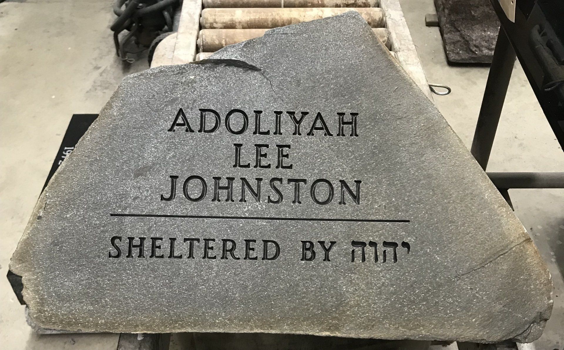 Stone memorial engraved with 