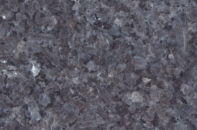 Dark blue granite surface with textured pattern.