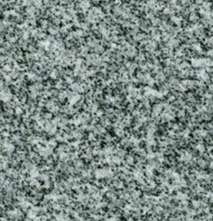 Gray granite surface, speckled with dark gray and white grains.