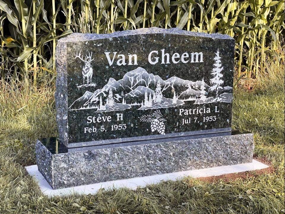Headstone with Van Gheem surname, mountains, deer, and tree engravings; names Steve and Patricia.