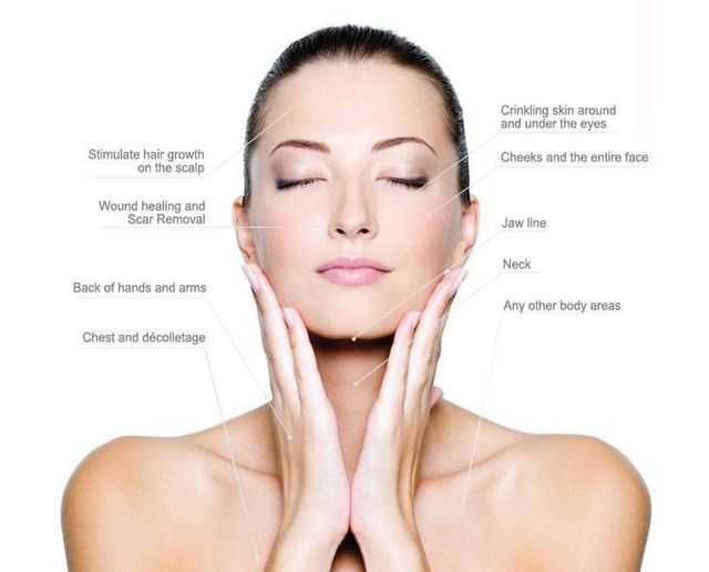 Woman with closed eyes, touching her face with both hands