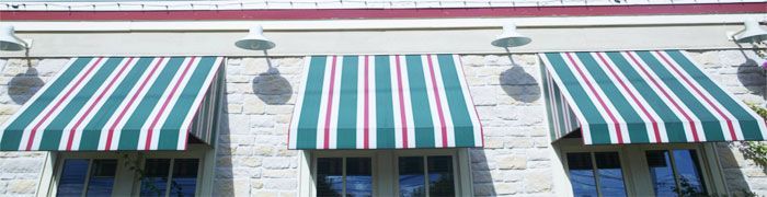 Striped front awning in commercial area