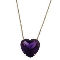 Silver necklace with a large, purple heart-shaped gemstone pendant.