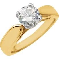 Gold ring with a clear, round diamond.