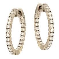 Pair of diamond hoop earrings, set in white gold.