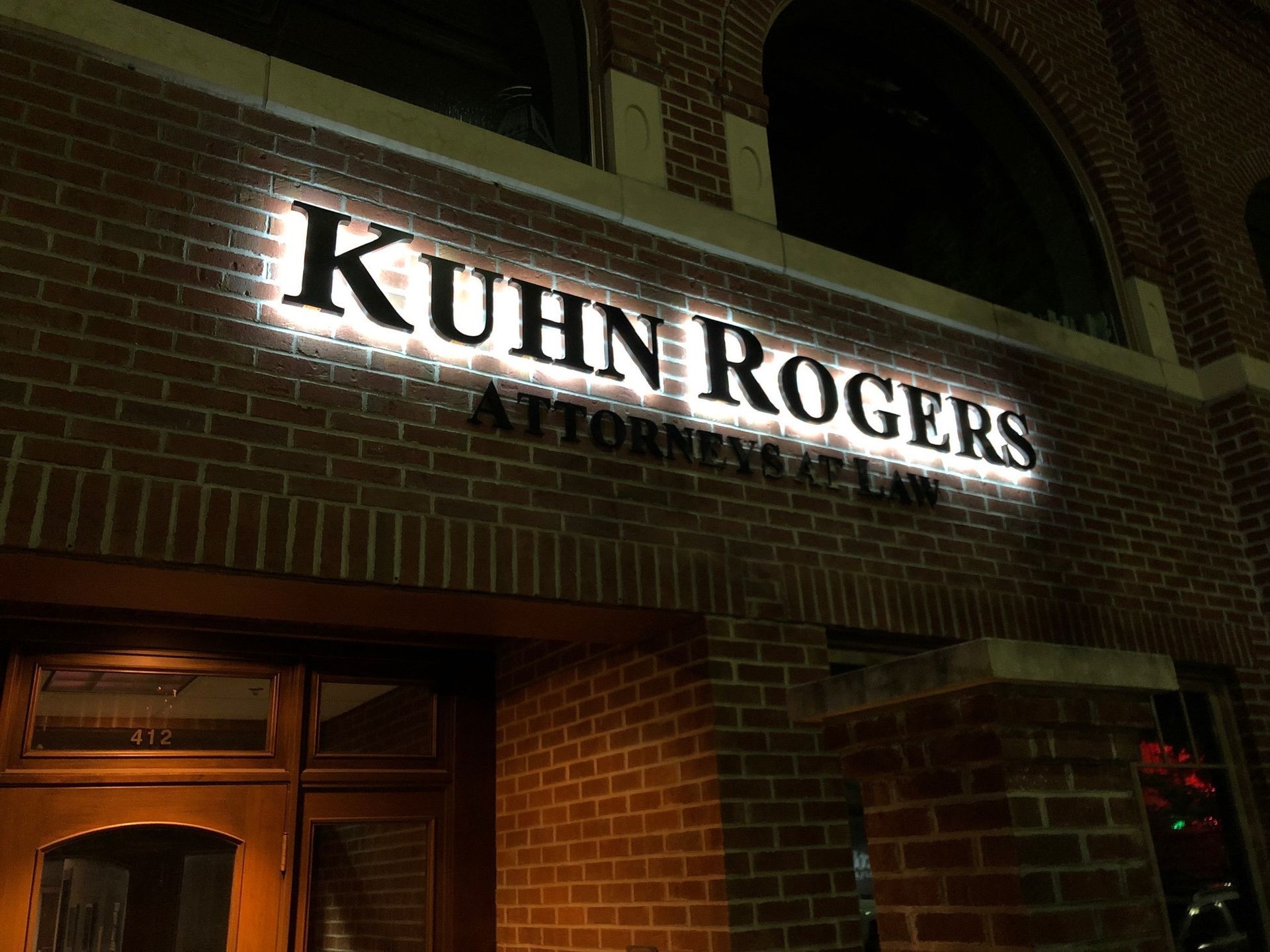 Kuhn Rogers custom lit attorney office sign