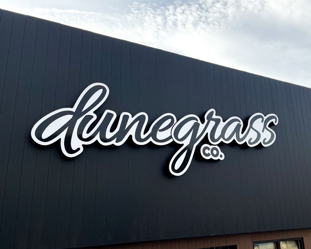 dunegrass lit exterior custom sign